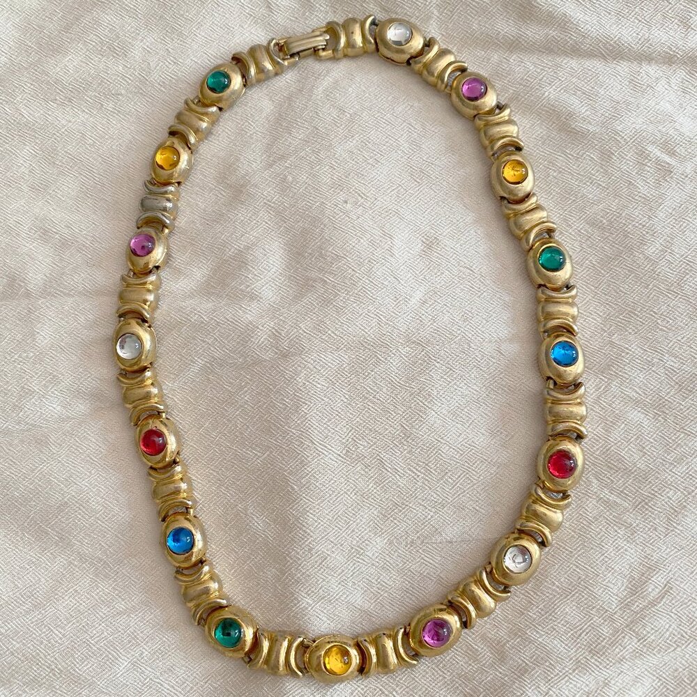 Goldtone costume glass necklace.